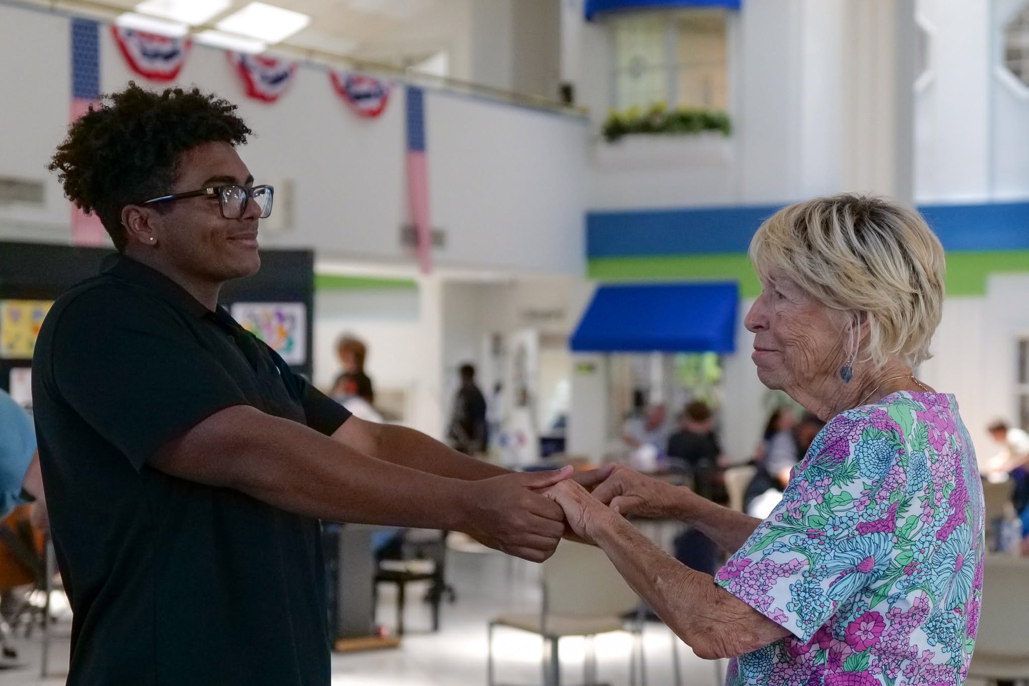 Sarasota Football players visiting Senior Friendship Centers